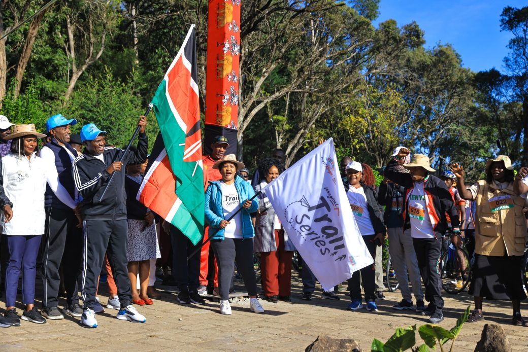 2 Head of Public Service Felix Kosgei and CS for Tourism and Wildlife Rebecca Miano flag off riders and hikers participating in the Inaugural Magical Kenya Mountain and Trail series .