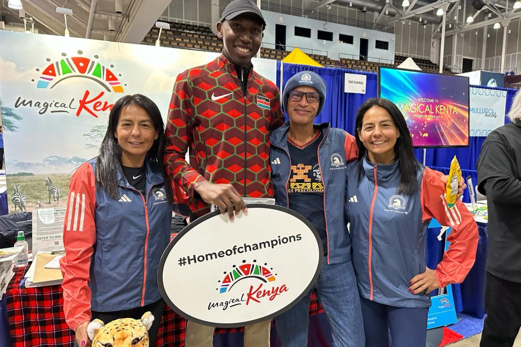 Kenyan runner Amos Rono interacts with Boston Marathon fans at the KTB expo stand ahead of the Boston Marathon scheduled for Monday 15th April