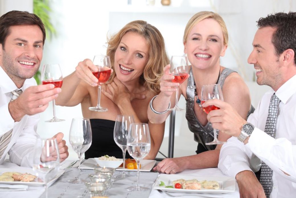 bigstock-Group-of-adults-having-a-dinne-25736660